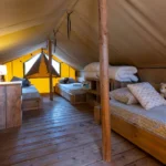 Punta Mila - Glamping4all - slaapkamer voor 3 personen op verdieping in safaritent 5 personen